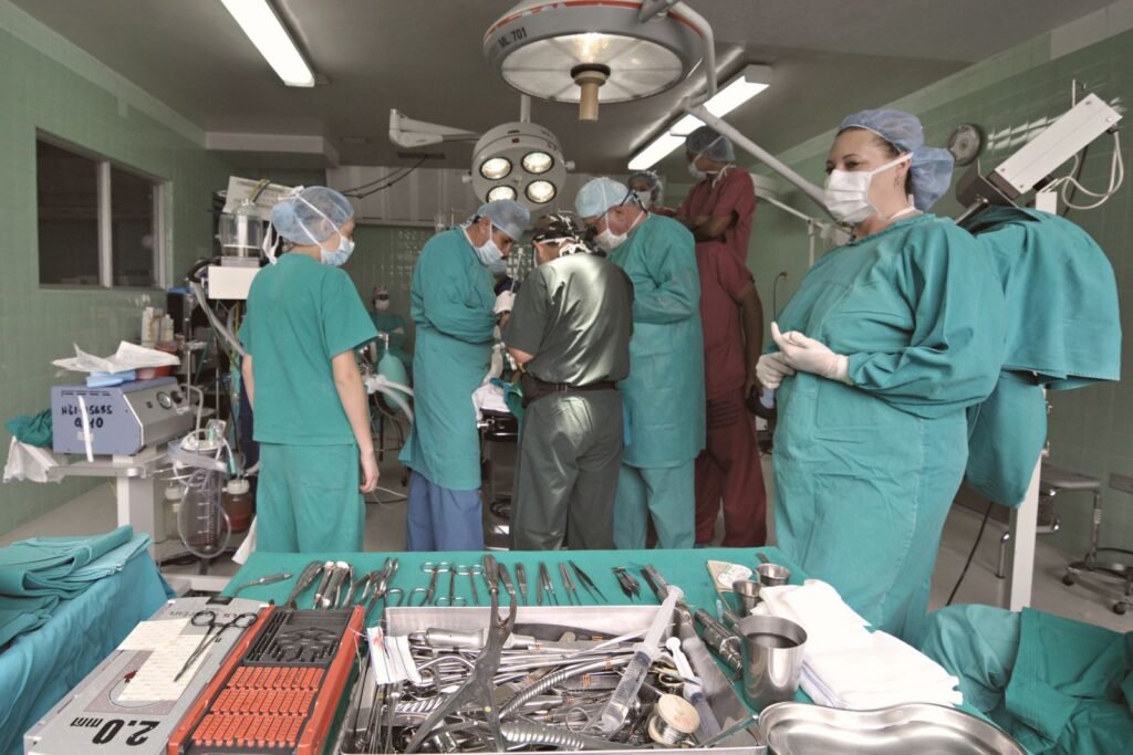 Surgical team operating in a theatre